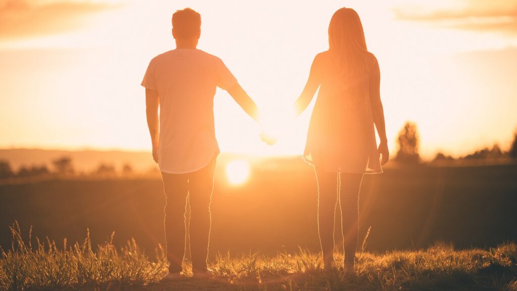 people, holding hands, sunset